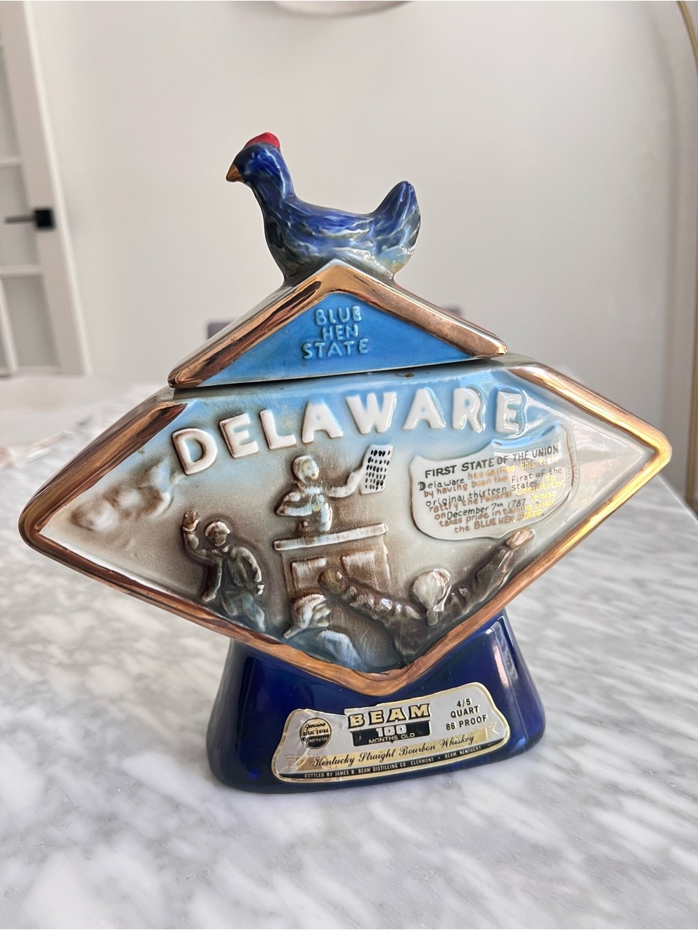 Vintage Jim Beam Delaware Blue Hen State Ceramic Decanter - Blue and Gold